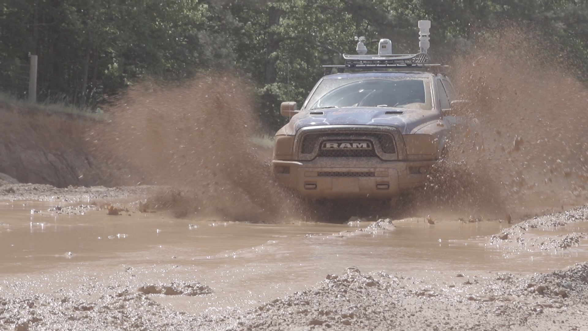 11alive.com | StormTracker ThunderTruck goes mudding... and it's awesome