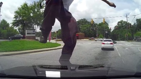 Man stomps, smashes woman's car window | wcnc.com